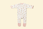 Back of baby rompersuit with pink alphabet pattern and pink accents